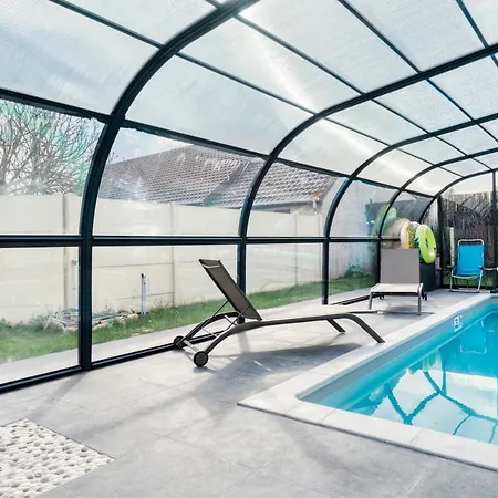 Holiday home Charmante Maison Avec Piscine Ranville